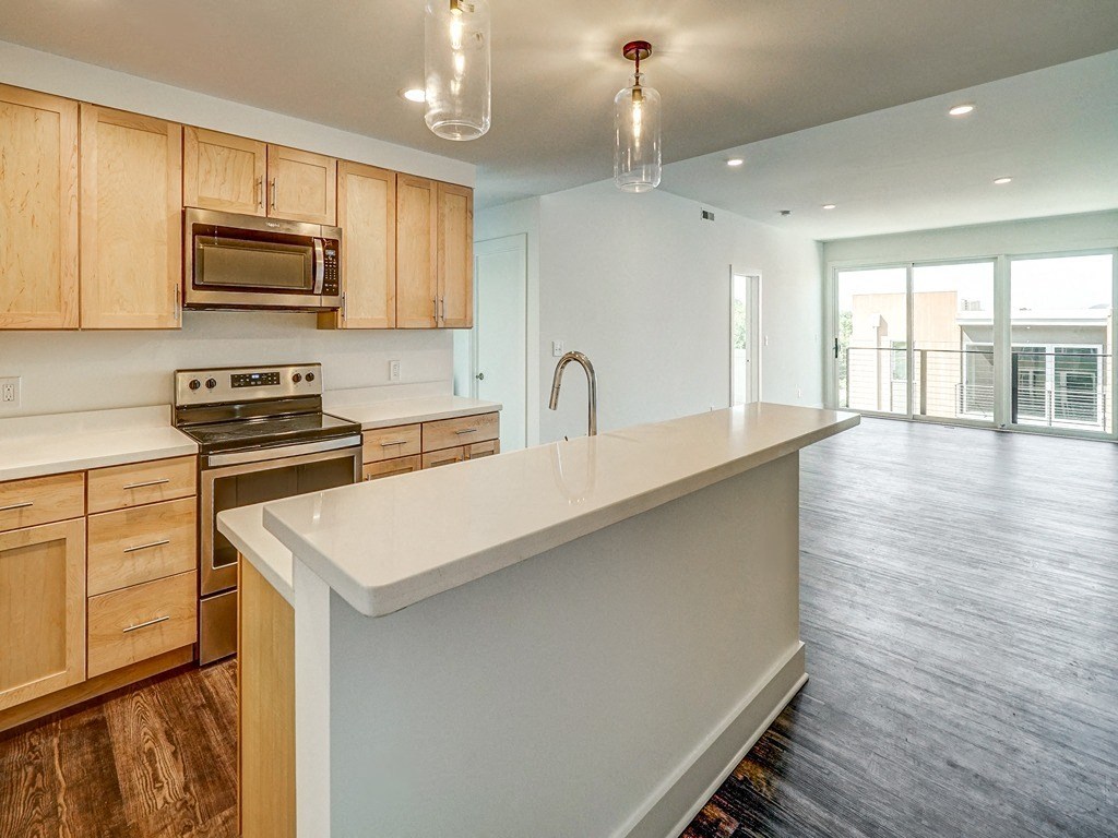 a 3d rendering of a kitchen and a living room with glass walls and floors