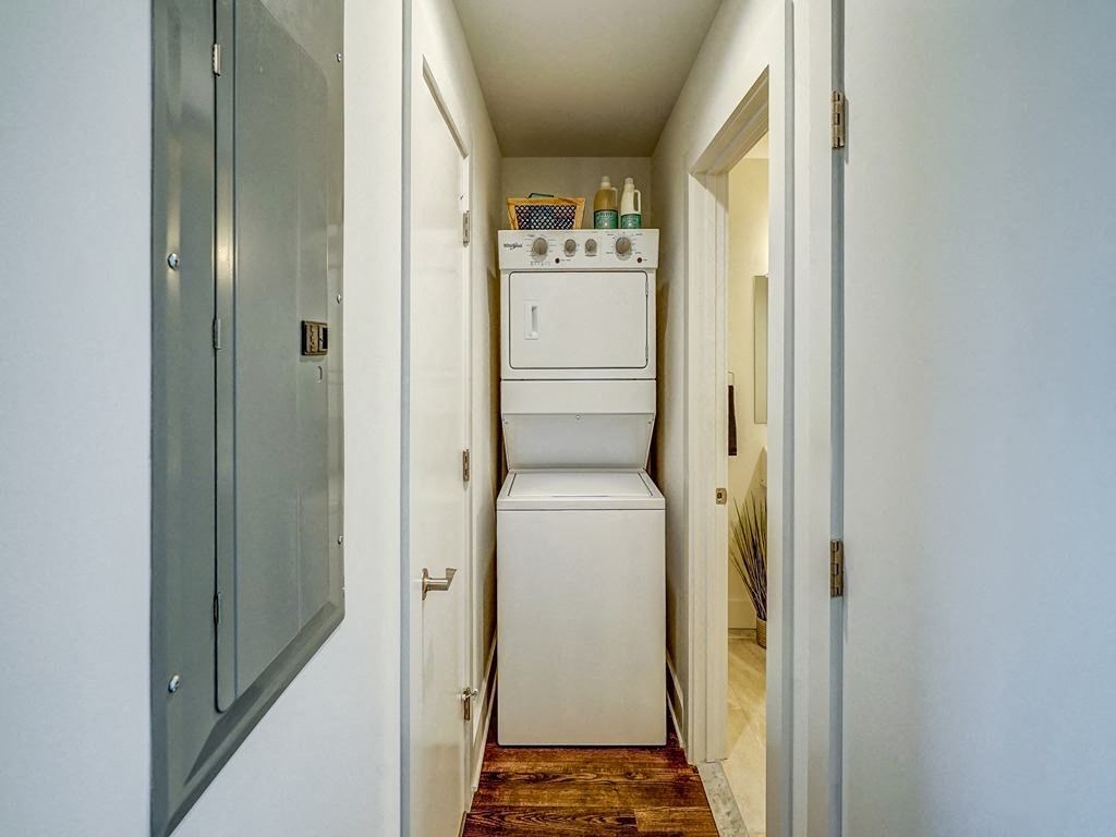 a small laundry room with a washer and dryer in it