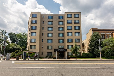 A large building with a flat roof and a sign that says "Pinnacle".