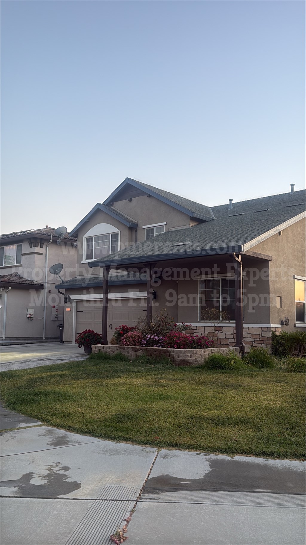 A building with a sign that says "management" in front of it.