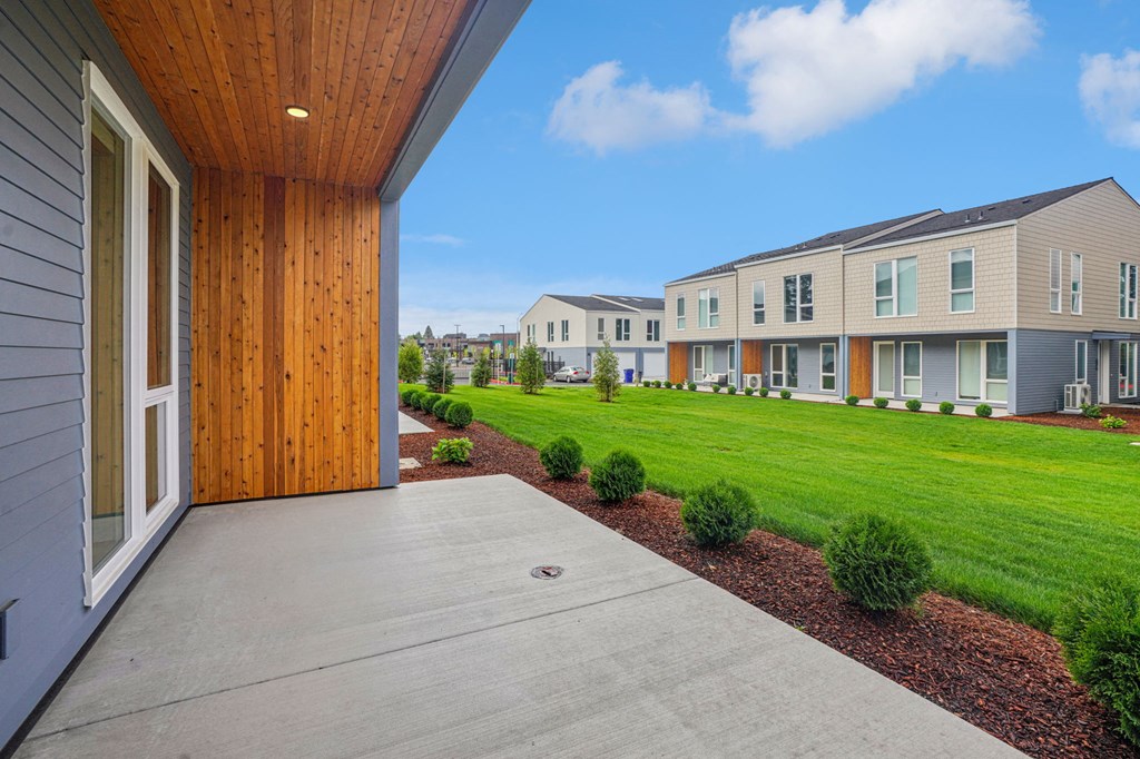 the outlook of the yards and buildings at ellis townhomes