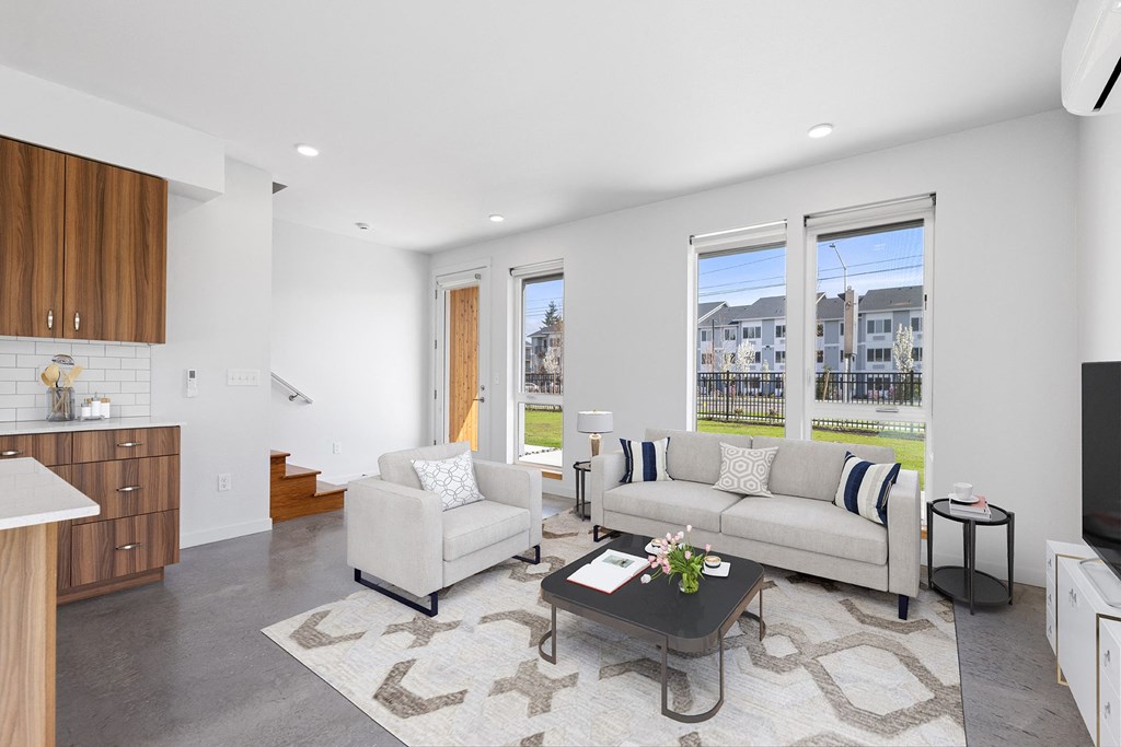 a living room with a couch and a coffee table