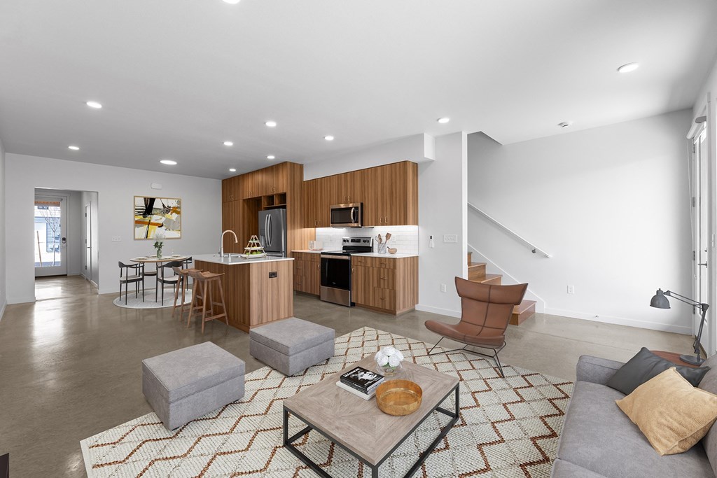 a living room with a couch and a table