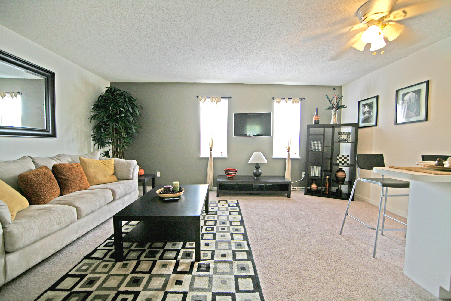 a living room with a couch and a table