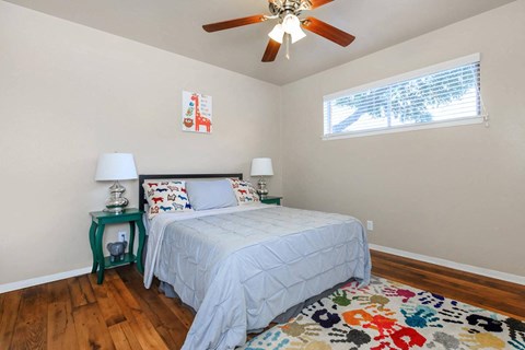 Bedroom With Ceiling Fan at Boston Woods Apartments, San Antonio TX, 78201