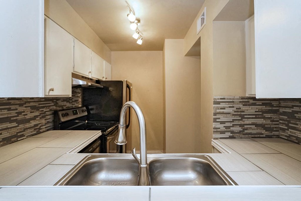 Double Stainless Steel Sink at Boston Woods Apartments, San Antonio TX. 78201