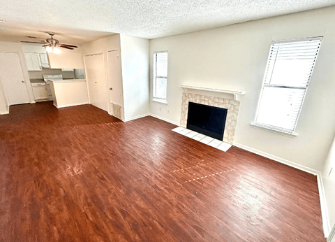 Empty Living Room with a fireplace at Callaghan Heights, San Antonio, TX