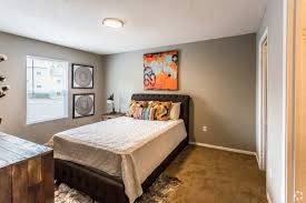 a bedroom with a bed and a window at Cedar Run Apartments, Memphis, Tennessee