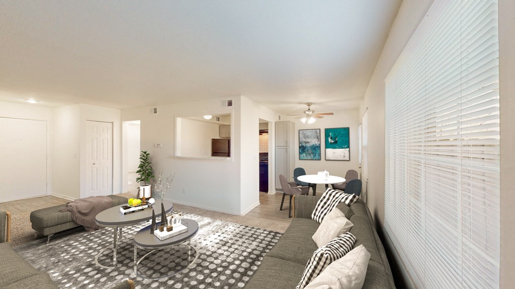 a living room with a couch and a table