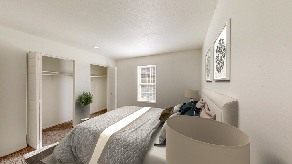 a bedroom with a large bed and a closet