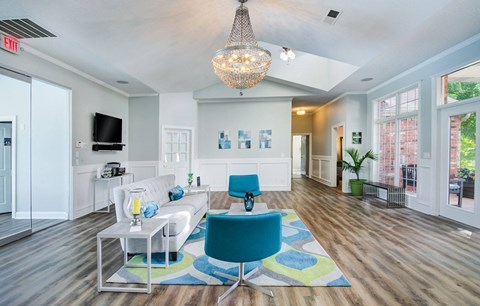 a living room with a couch and a table
