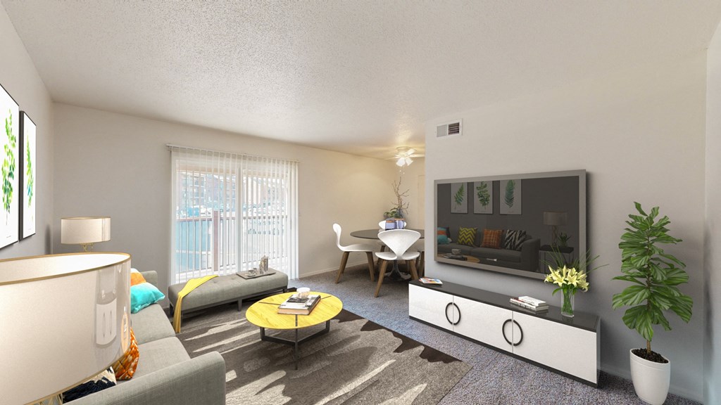 a living room with a couch and a table and a tv