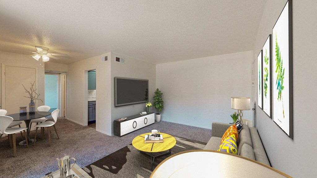 a living room with a couch and a tv