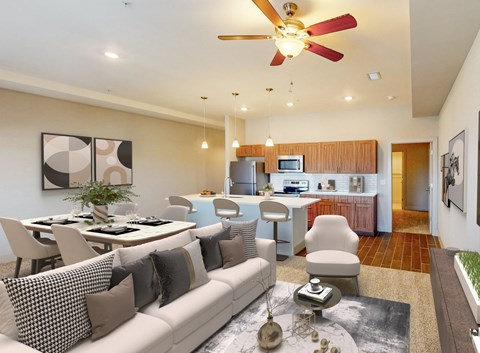 A modern living room with a white sofa and a dining table.
