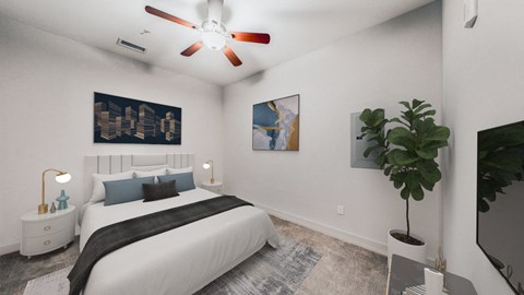 A bedroom with a bed, a ceiling fan, and a potted plant.