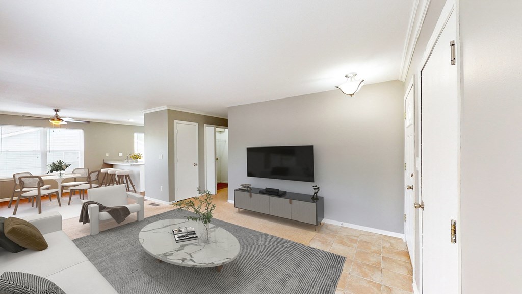 a living room with a couch and a table