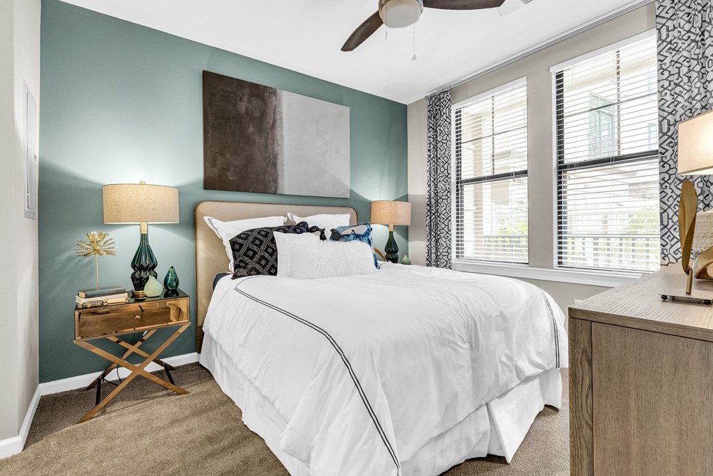 Large bedroom space with lots of natural light