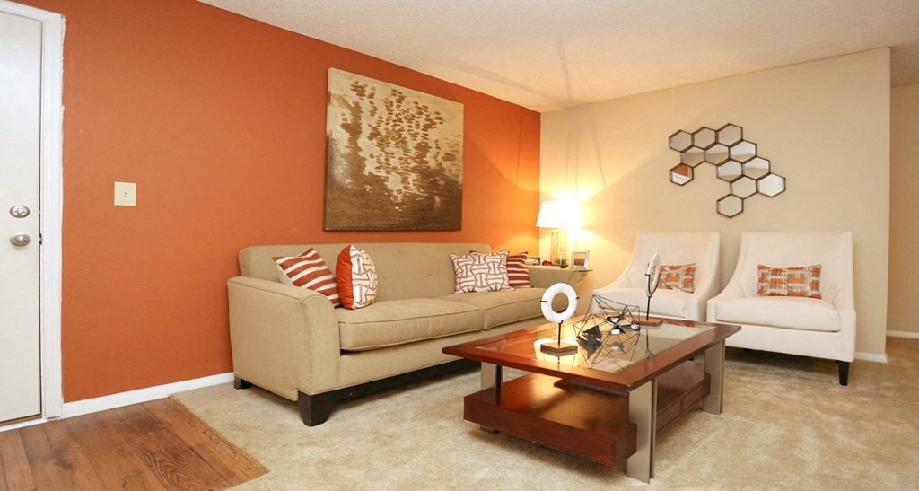 a living room with a couch and a coffee table