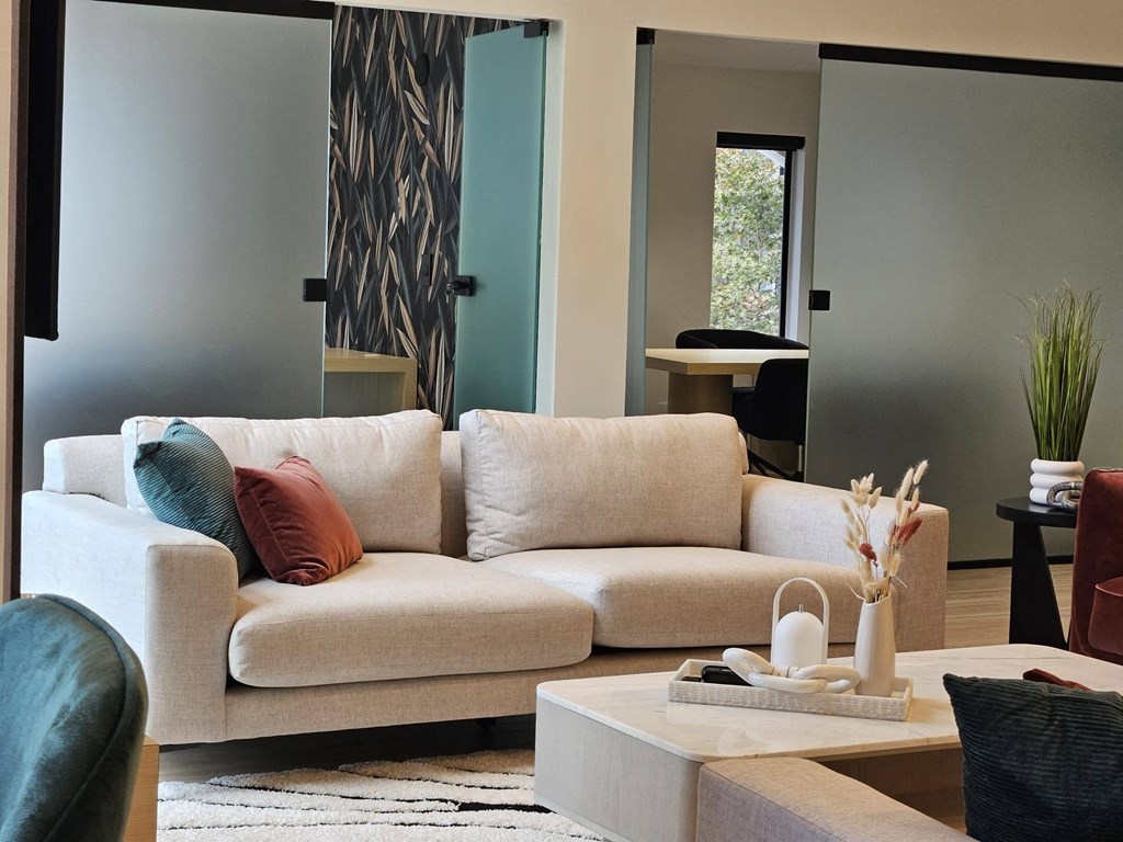 a living room with a couch and a coffee table