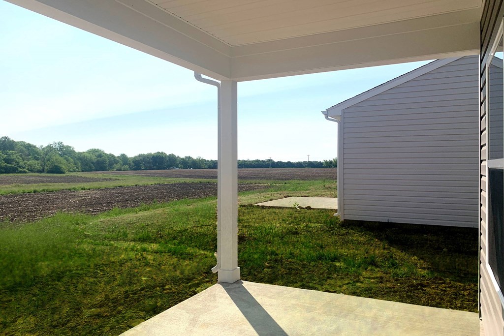 a view of the farm from the porch