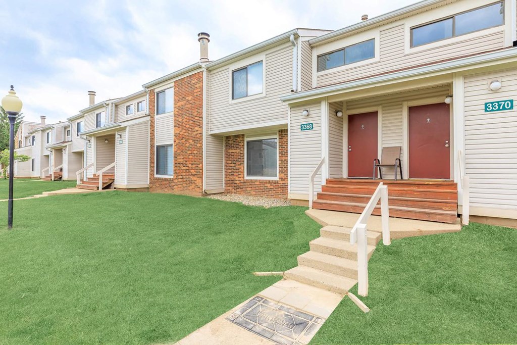 Apartment building with number 3370 on the front door.