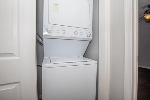 A white dishwasher is installed in a kitchen.