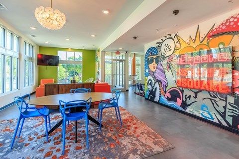 A brightly colored mural with the word "Inspire" written on it.