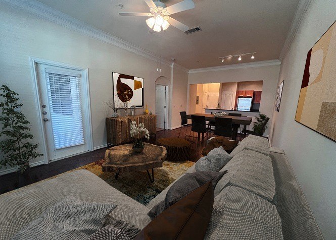 a living room with a couch and a table