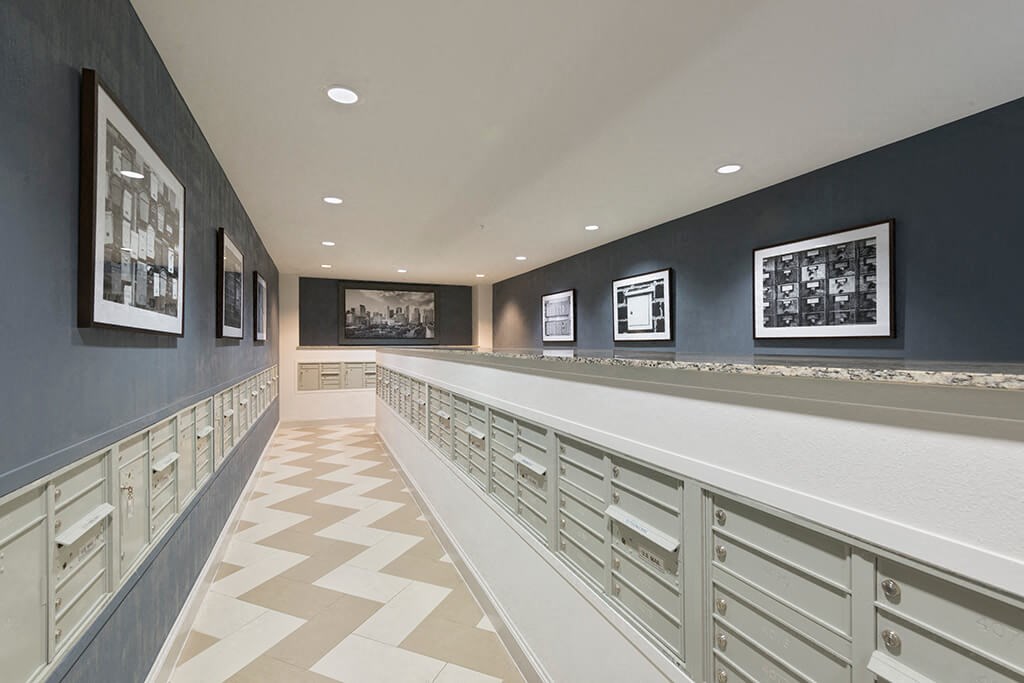 a locker room in a gym with a long counter