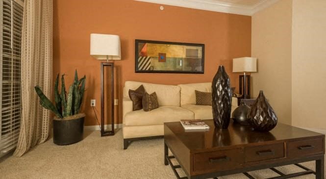 a living room with a couch and a coffee table