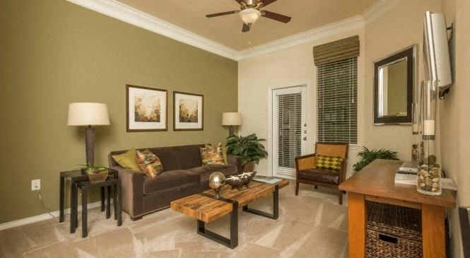 a living room with a couch and a table