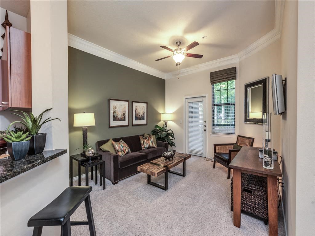 a living room with a couch and a table