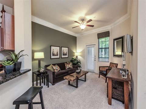 a living room with a couch and a table