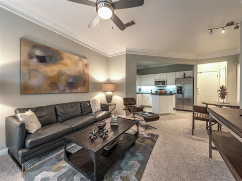 a living room with a couch and a table