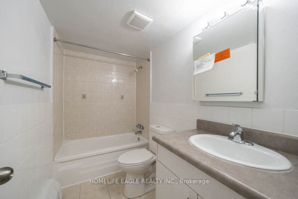 a bathroom with a sink toilet and a shower