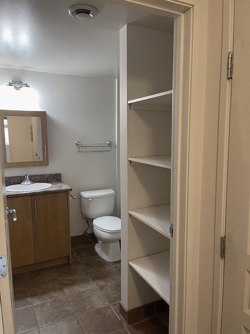 a small bathroom with a toilet and a sink