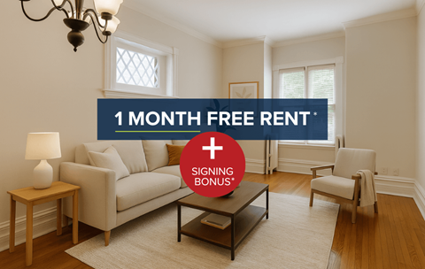 A living room with a couch, chair, and coffee table is advertised with a 1 month free rent and signing bonus.
