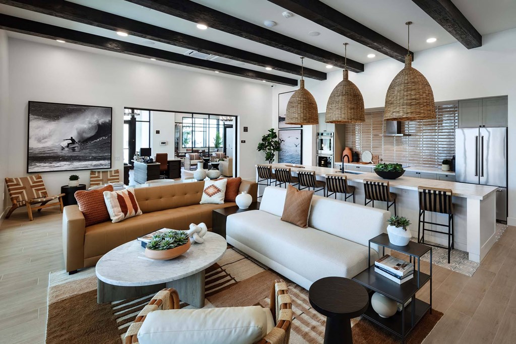 a living room with a couch and a table at Luma at El Corazon Apartments, Oceanside, CA 92056