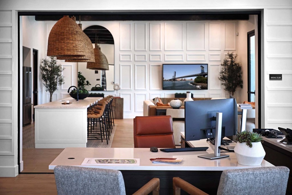 a kitchen and living room with a desk and a computer at Luma at El Corazon Apartments, Oceanside, 92056