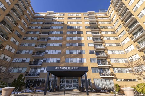 The Belmont Heights building is a large, multi-story residential building.