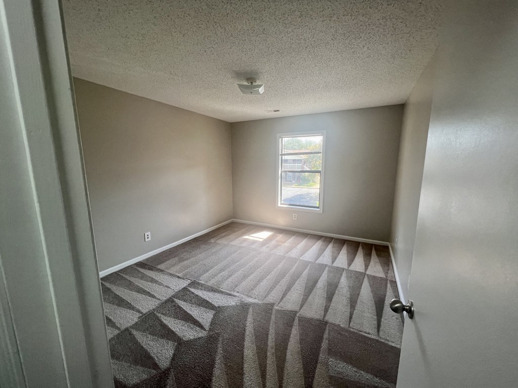 an empty room with a window