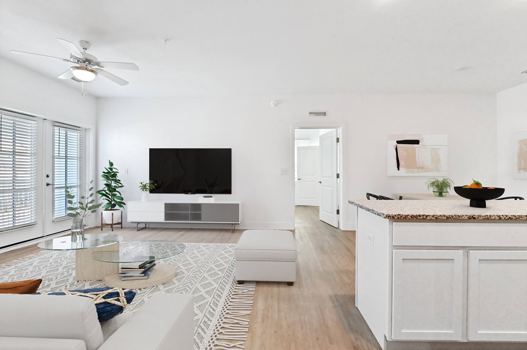 a living room with a couch and a table
