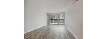 Vacant Room with Glass Windows at Lakeridge Terrace Apartments, Denver