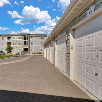 a garage at the whispering winds apartments in pearland, tx