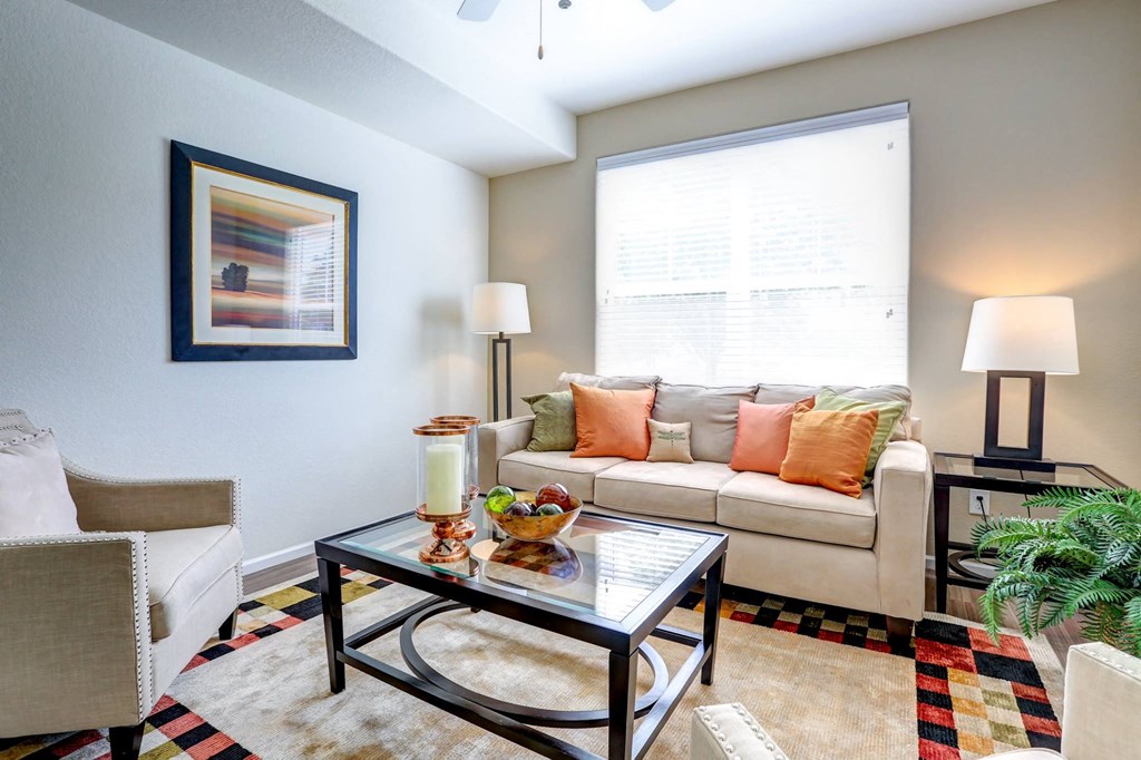 a living room with a couch and a coffee table