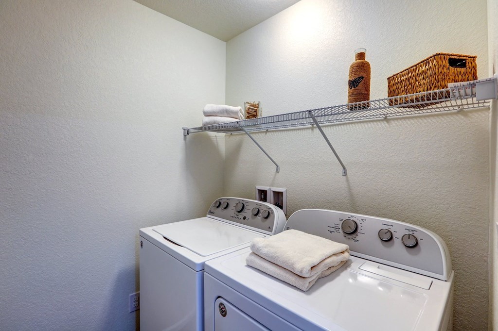 a washer and dryer in the laundry room