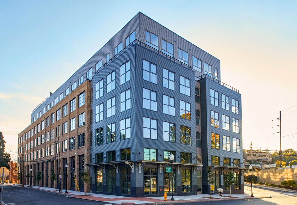 a large building on the corner of a city street
