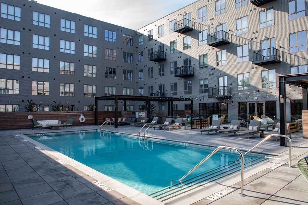 a swimming pool a swimming pool in a large building at Sono Central Residential, Norwalk, Connecticut