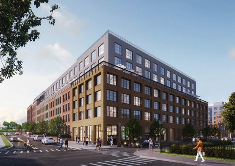 A large building with a lot of windows is being constructed.