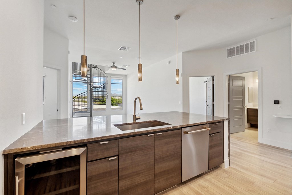 the island in the kitchen of a new home